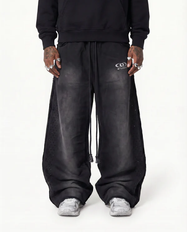 freepik__change-the-model-img1-race-to-black-give-him-chrom__23464 ARCHIVE ONYX RHINESTONE SWEATPANTS - BLACK